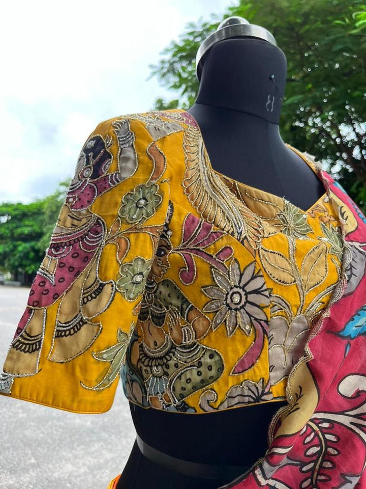Bright Yellow Kalamkari Silk Lehenga by myRiti, featuring traditional hand-painted designs, perfect for festive occasions and weddings