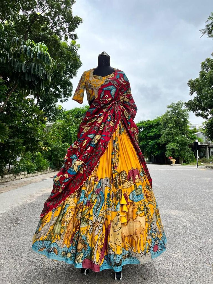 Bright Yellow Kalamkari Silk Lehenga by myRiti, featuring traditional hand-painted designs, perfect for festive occasions and weddings