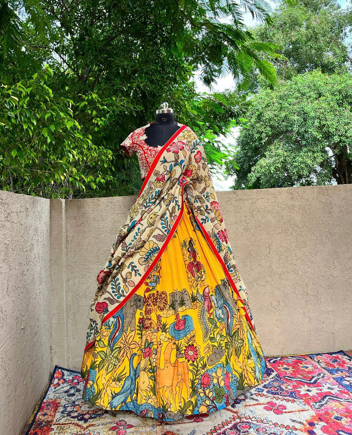 Bright Yellow Kalamkari Silk Lehenga by myRiti, featuring traditional hand-painted designs, perfect for festive occasions and weddings