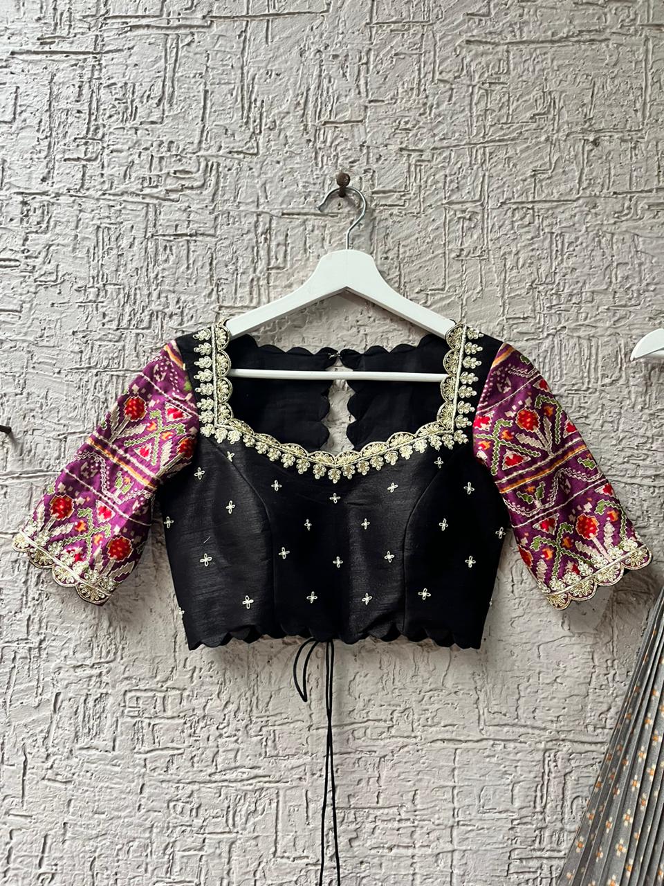 Beige & Black Lehenga with Bandani Patola at myriti. So, why wait? Head over to www.myriti.com and make it yours today. Trust us, you're going to look absolutely stunning!