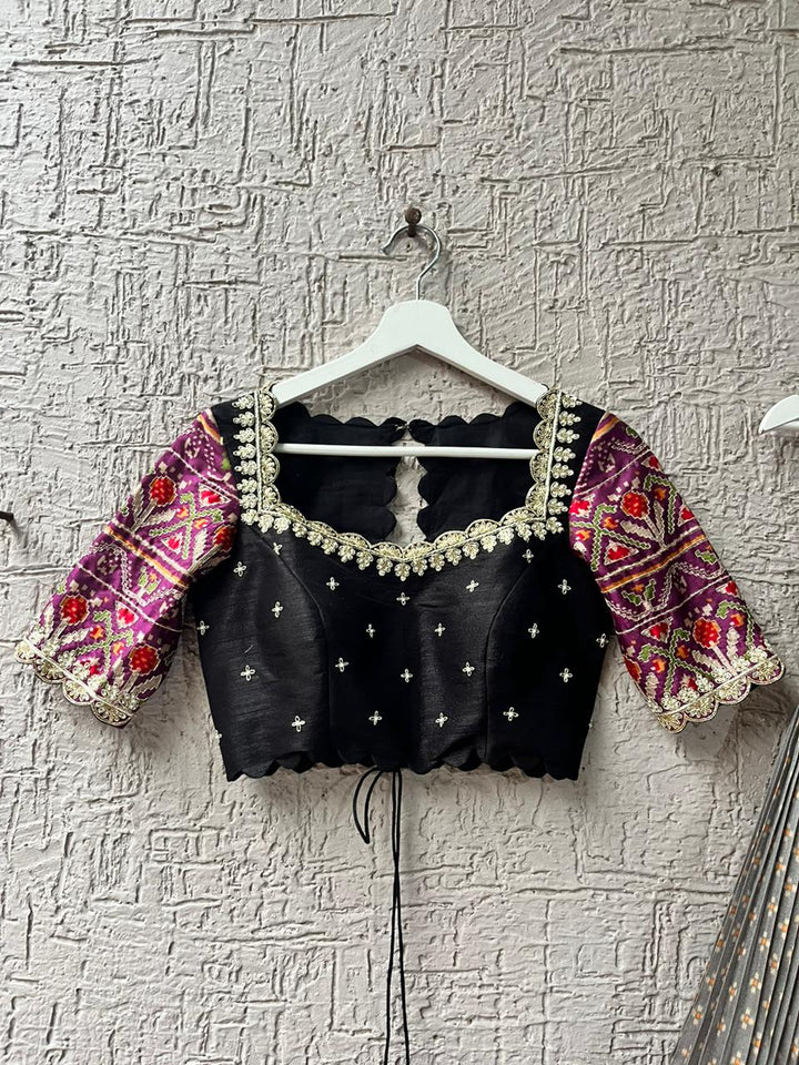 Beige & Black Lehenga with Bandani Patola at myriti. So, why wait? Head over to www.myriti.com and make it yours today. Trust us, you're going to look absolutely stunning!