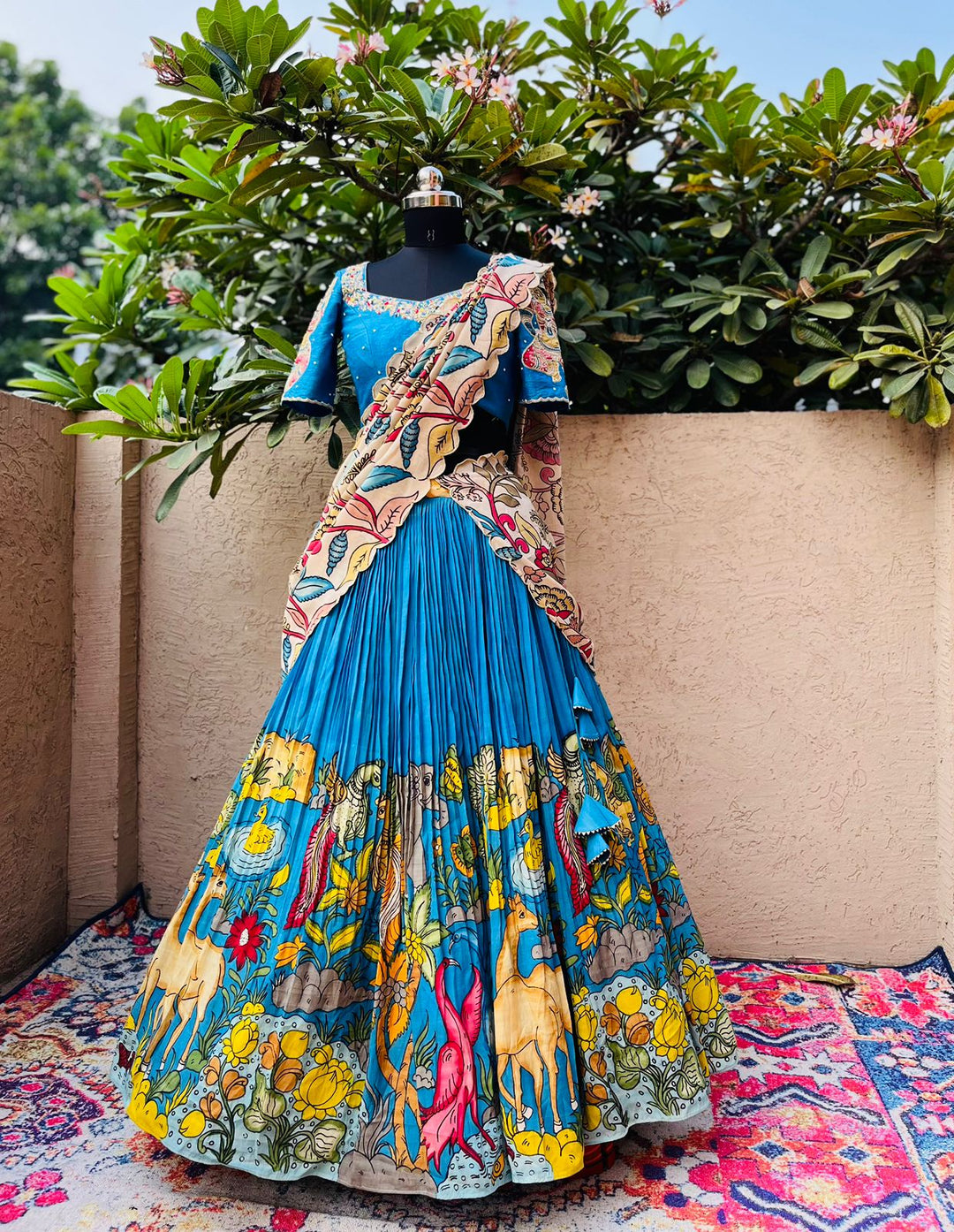 Stunning Blue Kalamkari Silk Lehenga by myRiti, featuring elegant traditional patterns, perfect for weddings and cultural events