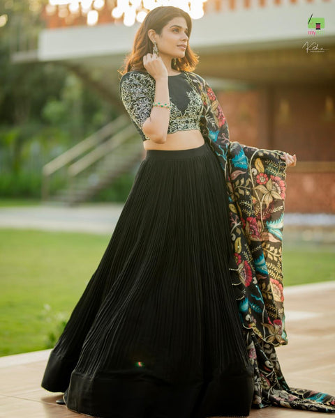 Elegant Black Lehenga in Natural Crape from myRiti.com, paired with a traditional Kalamkari Dupatta, showcasing a unique blend of contemporary style and classic artistry, perfect for ethnic fashion enthusiasts.