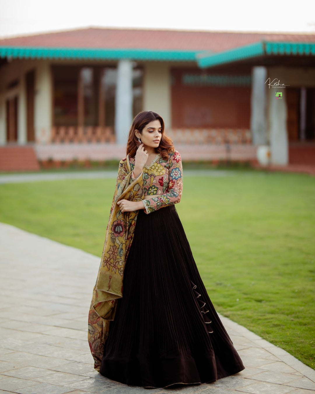 Black Lehenga in Natural Crape Paired with a Traditional Kalamkari Dupatta