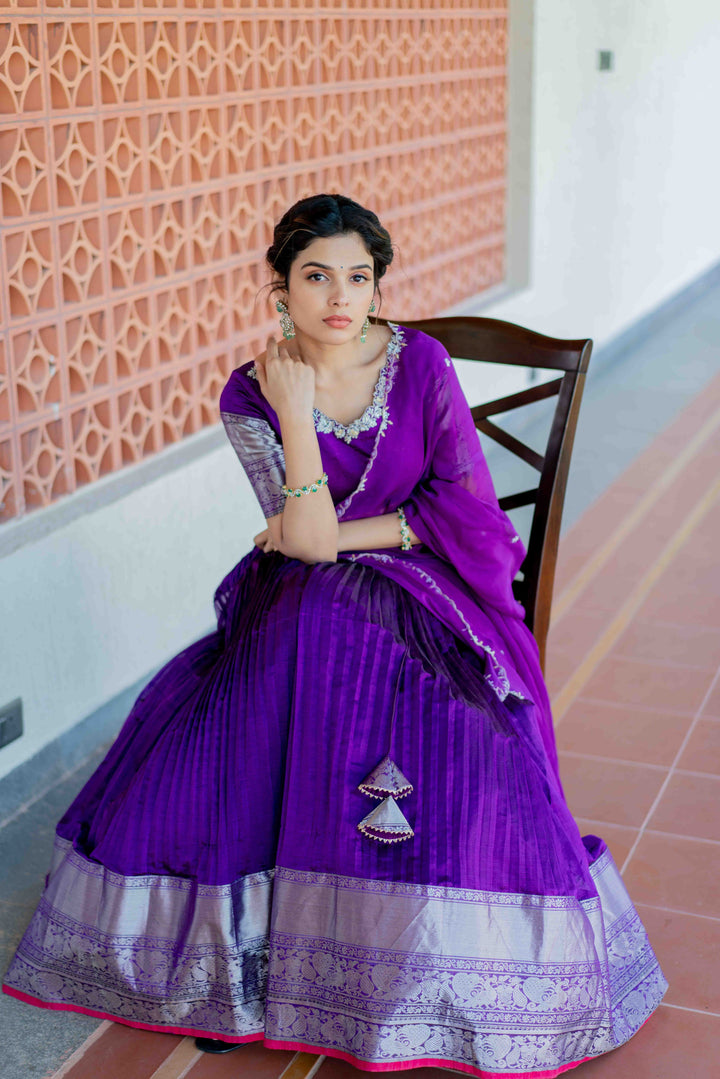 Stunning Purple Mangalgiri Lehenga with intricate traditional patterns, perfect for weddings and festive occasions.
