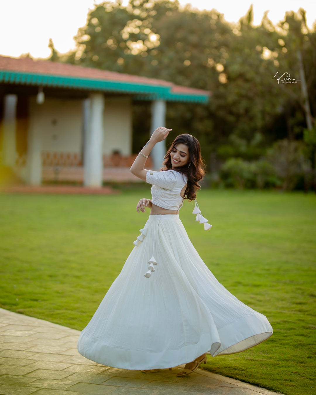 Elegant White Lehenga paired with a vibrant Kalamkari Dupatta, a perfect fusion of modern style and traditional art, available exclusively at MyRiti.