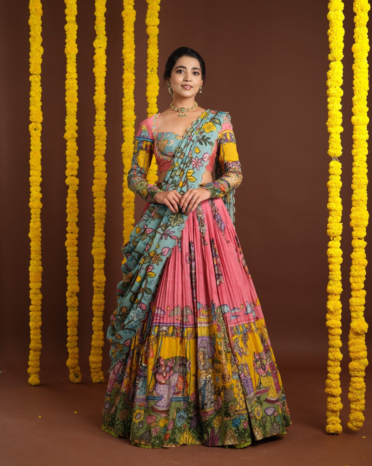 Elegant Kalamkari Lehenga in Rani Pink and Teal Green with Mythological Print and Floral Dupatta main image 0