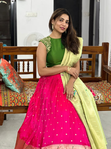 "Stunning Pink Lehenga in Paithani Silk featuring a blend of green and pink hues, showcased on myRiti, ideal for highlighting traditional elegance with a modern twist.