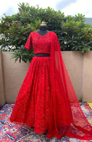 Stunning Bridal Red Net Lehenga, perfect for brides looking for a traditional yet modern wedding dress.