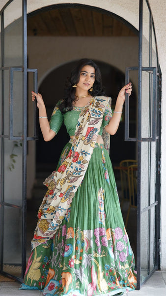 Bright Green Kalamkari Silk Lehenga by myRiti, featuring traditional hand-painted designs, perfect for festive occasions and weddings