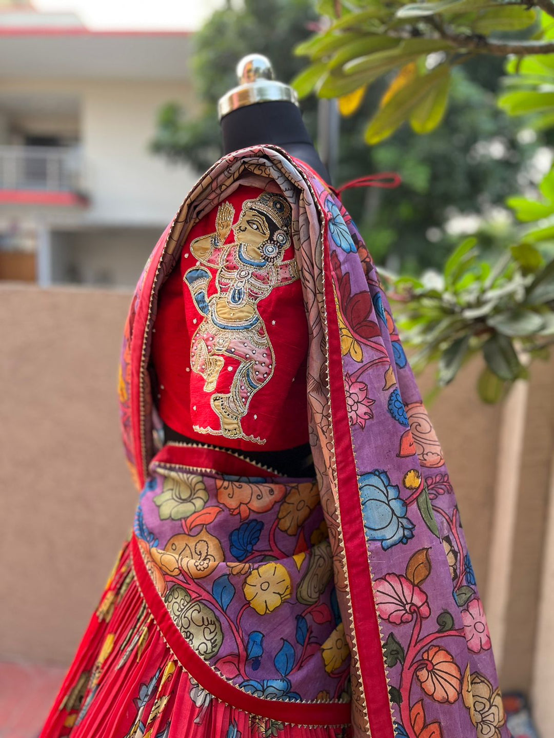 Stunning Red Kalamkari Silk Lehenga by myRiti, featuring intricate traditional designs on rich silk fabric, perfect for festive and bridal wear