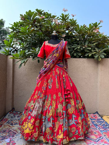 Stunning Red Kalamkari Silk Lehenga by myRiti, featuring intricate traditional designs on rich silk fabric, perfect for festive and bridal wear