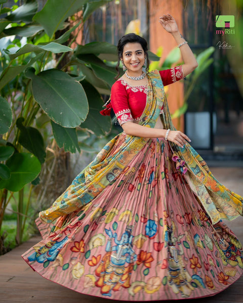 Elegant Red & Peach Kalamkari Silk Lehenga by myRiti, showcasing a beautiful blend of colors and traditional designs, ideal for weddings and special occasions
