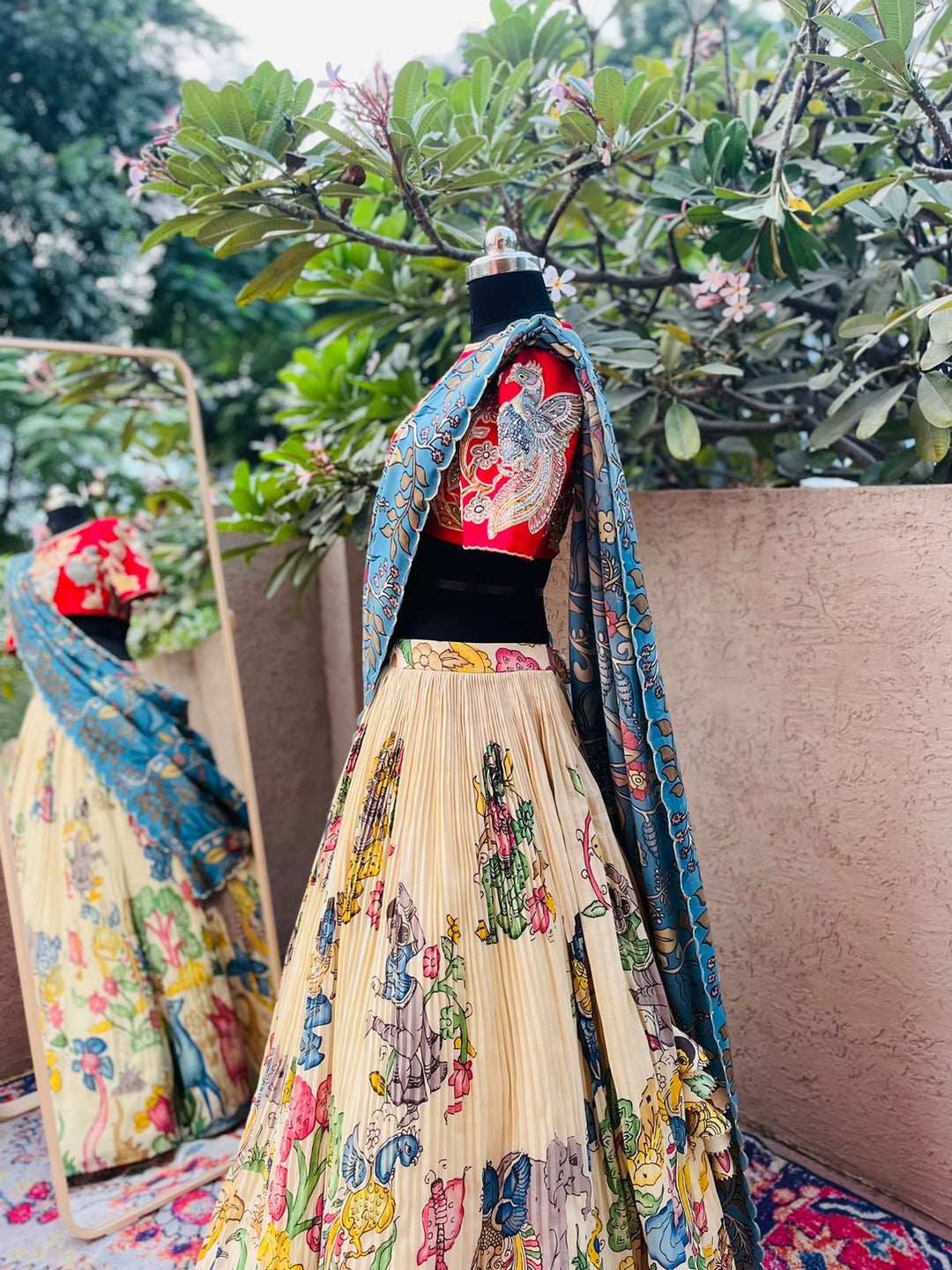 Elegant Red and Cream Kalamkari Silk Lehenga by myRiti, featuring intricate traditional Indian patterns