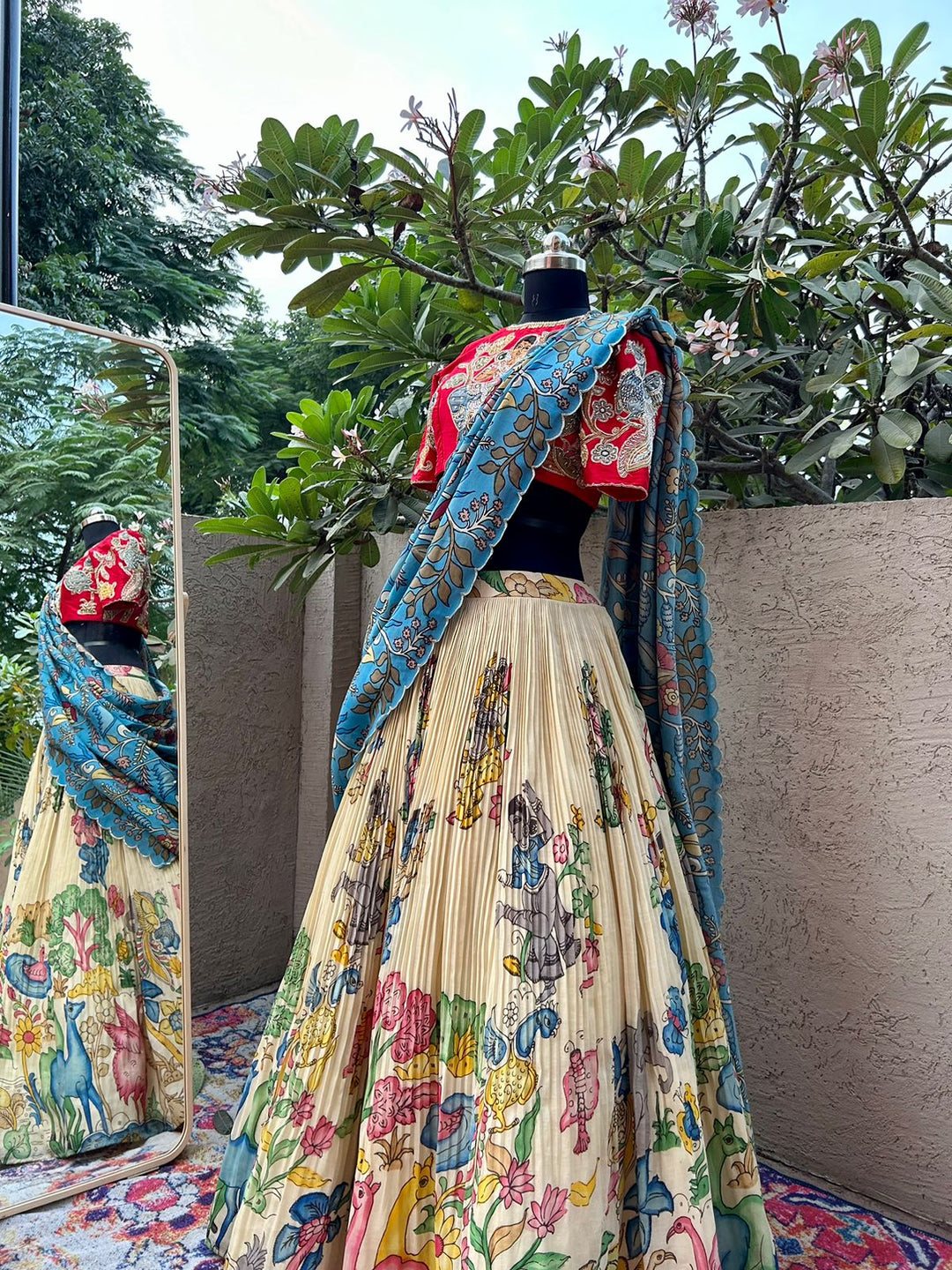 Elegant Red and Cream Kalamkari Silk Lehenga by myRiti, featuring intricate traditional Indian patterns