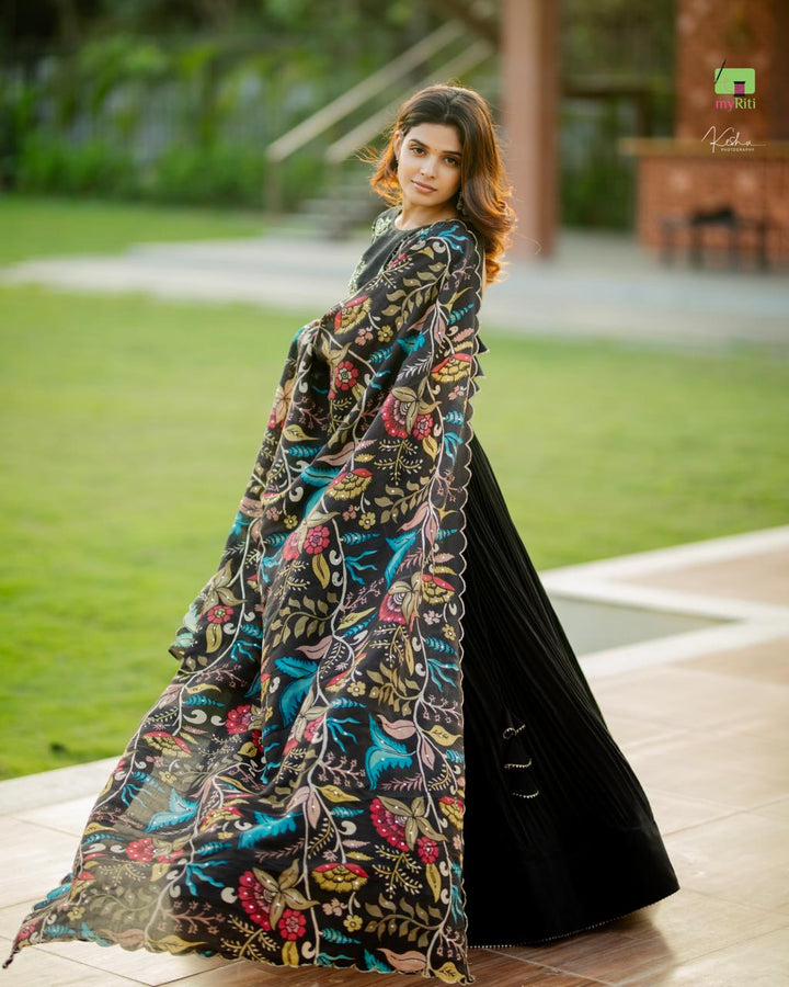 Elegant Black Lehenga in Natural Crape from myRiti.com, paired with a traditional Kalamkari Dupatta, showcasing a unique blend of contemporary style and classic artistry, perfect for ethnic fashion enthusiasts.