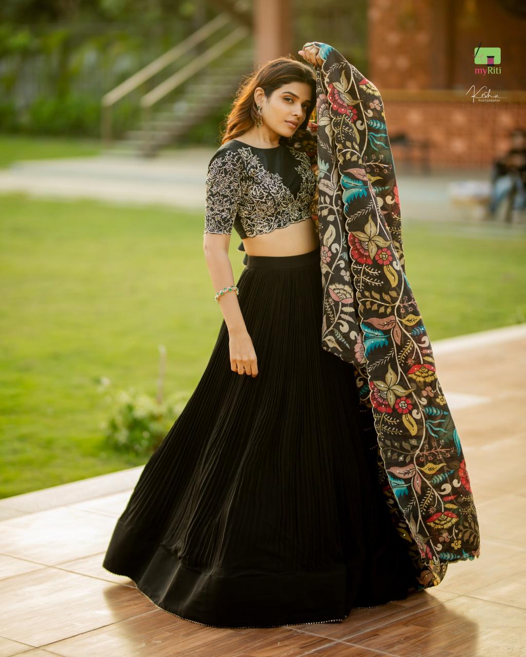 Kalamkari printed and store pleated full volume skirt with Chikankari Crop top paired with beautiful Georgett Green Laheriya dupatta