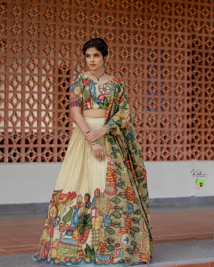 Elegant Cream Kalamkari Lehenga featuring traditional hand-painted designs, available at www.myriti.com. Perfect blend of classic art and modern fashion.