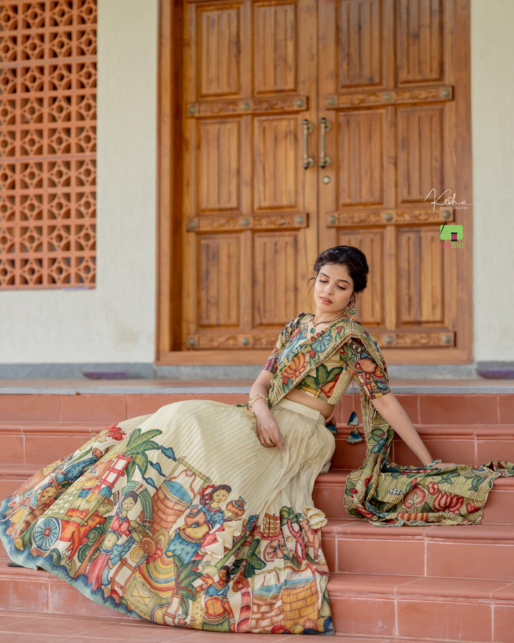 Elegant Cream Kalamkari Lehenga featuring traditional hand-painted designs, available at www.myriti.com. Perfect blend of classic art and modern fashion.