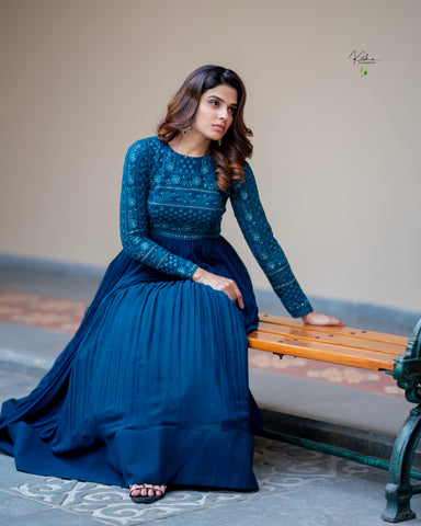 Stunning Peacock Blue Chikankari Dress from MyRiti, featuring delicate traditional embroidery on a vibrant blue fabric. Perfect for adding elegance to any special occasion.