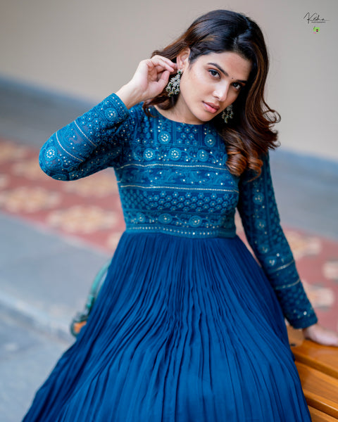 Stunning Peacock Blue Chikankari Dress from MyRiti, featuring delicate traditional embroidery on a vibrant blue fabric. Perfect for adding elegance to any special occasion.