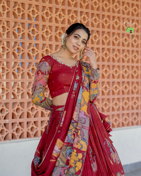 Traditional Maroon Kalamkari Lehenga paired with a matching Maroon Dupatta, featuring intricate hand-painted designs, available at MyRiti. Ideal for those seeking elegant and culturally rich online lehengas.