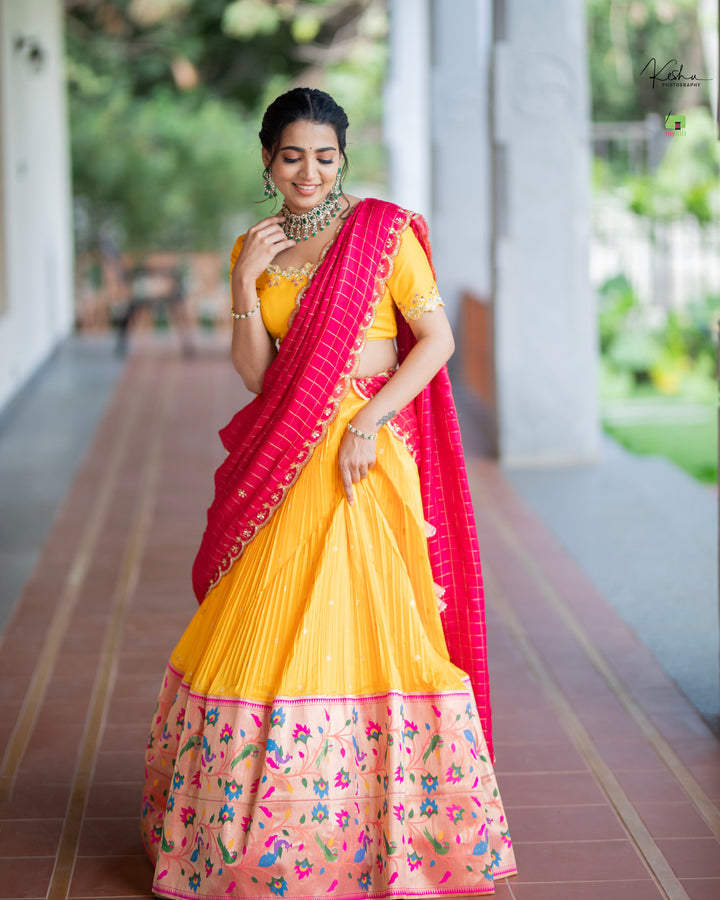 Vibrant Yellow Paithani Lehenga on myRiti, showcasing traditional Indian Paithani patterns with a modern twist, perfect for various festive occasions.