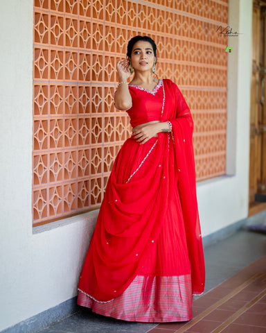 Stunning Red Mangalgiri Lehenga, showcasing vibrant traditional designs, available at myRiti.com. Perfect for adding a regal touch to any celebration or wedding event