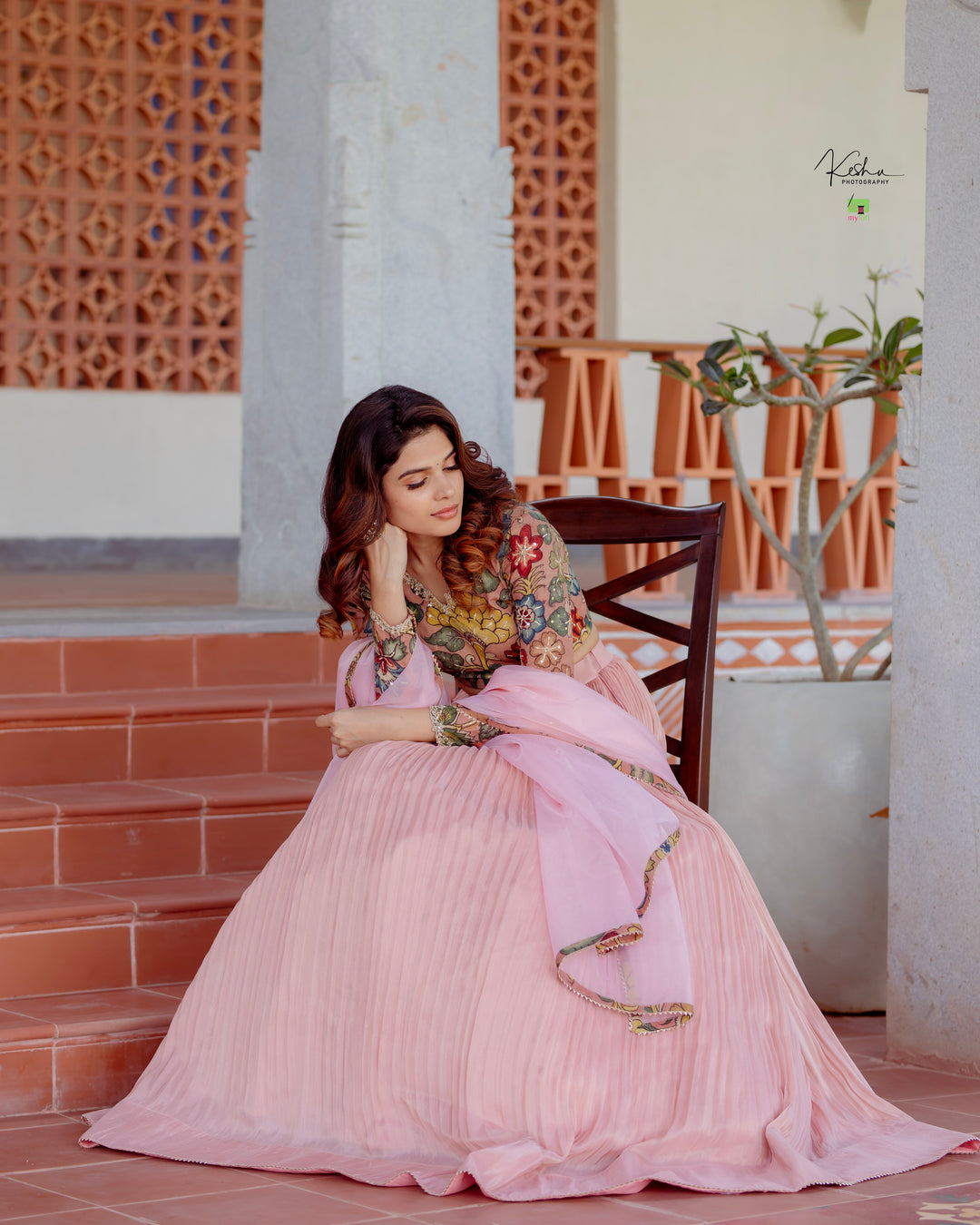 Elegant Pink Tissue Lehenga from MyRiti, showcasing a delicate and luxurious design. Perfect for special occasions, this Pink Lehenga combines traditional elegance with a modern touch.