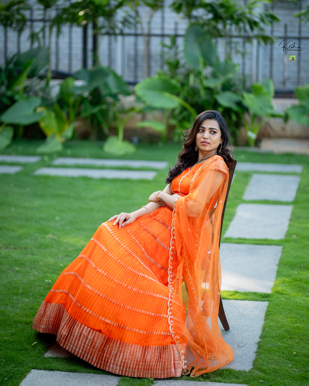 Breathtaking Orange Organza Lehenga from MyRiti, perfect for those seeking vibrant and elegant Indian wear online. This lehenga combines traditional craftsmanship with contemporary style.