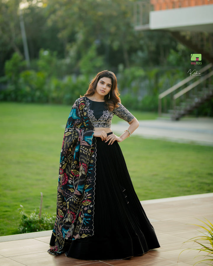 Elegant Black Lehenga in Natural Crape from myRiti.com, paired with a traditional Kalamkari Dupatta, showcasing a unique blend of contemporary style and classic artistry, perfect for ethnic fashion enthusiasts.