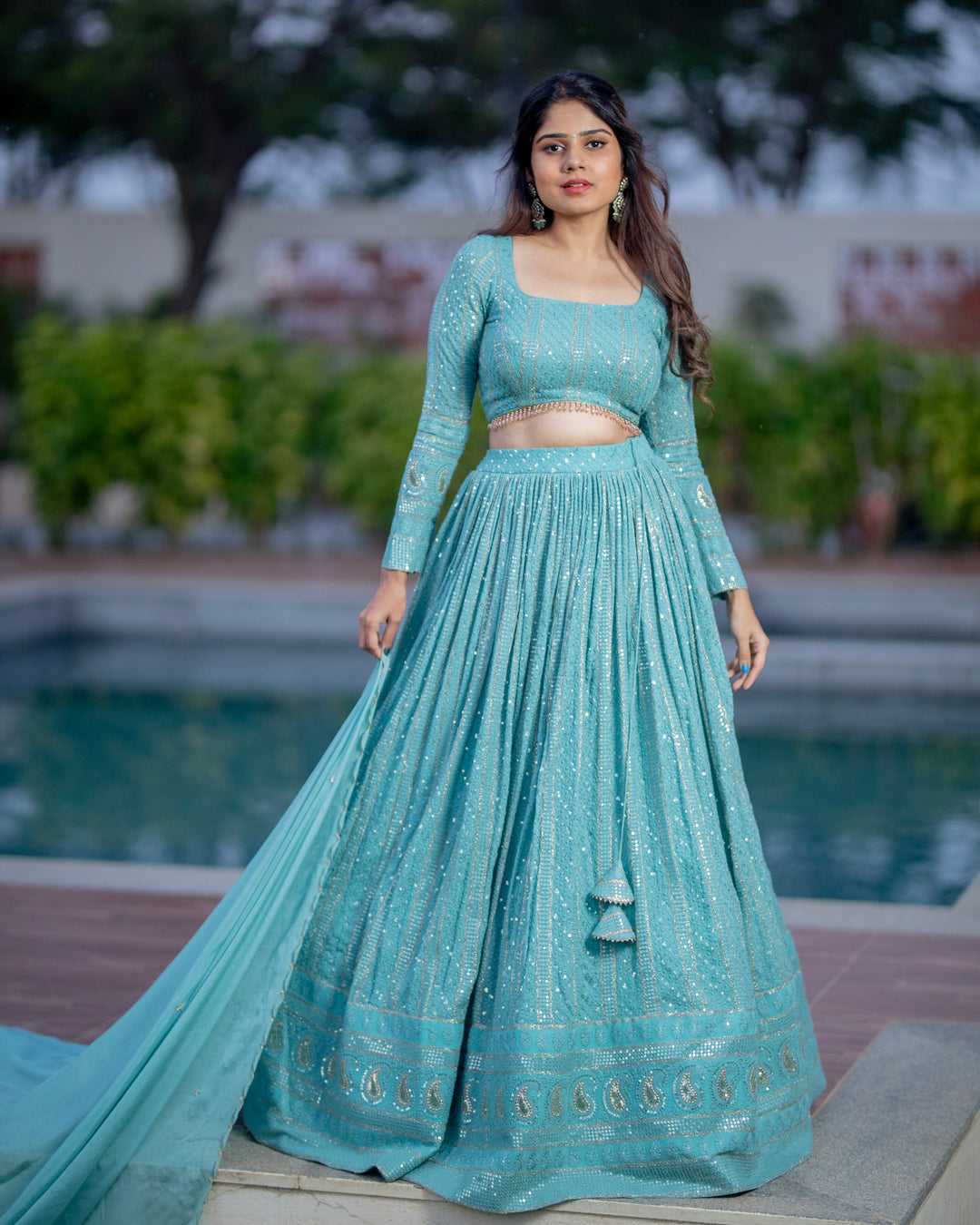 Powder Blue Chikankari Lehenga by myRiti, featuring intricate embroidery and a flowing skirt, perfect for weddings and festive occasions.