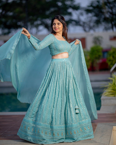 Powder Blue Chikankari Lehenga by myRiti, featuring intricate embroidery and a flowing skirt, perfect for weddings and festive occasions.