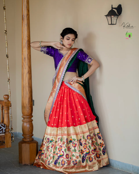 Radiant Red Paithani Lehenga, adorned with exquisite patterns, available at www.myriti.com. A perfect blend of traditional elegance and modern style, ideal for those who love the timeless beauty of Paithani Lehengas.