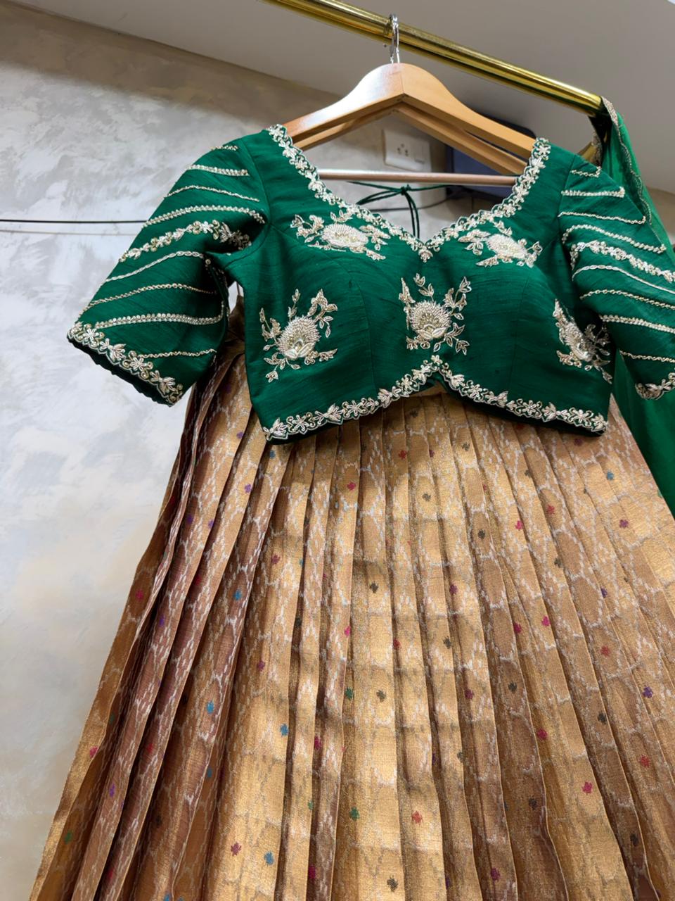 The  Bridal Green & Golden Tapestry Lehenga