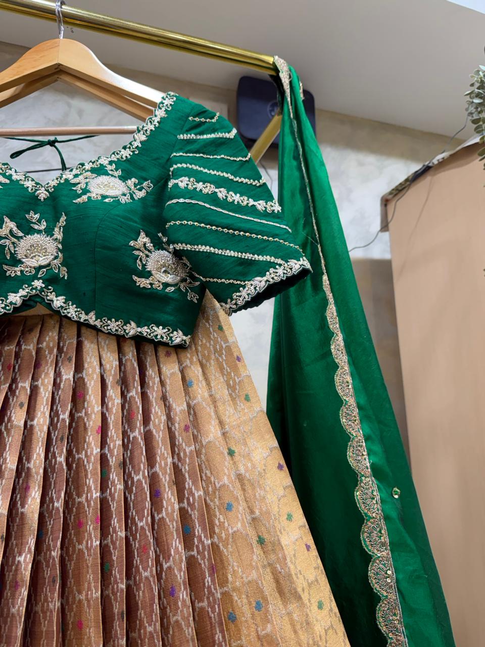 The  Bridal Green & Golden Tapestry Lehenga