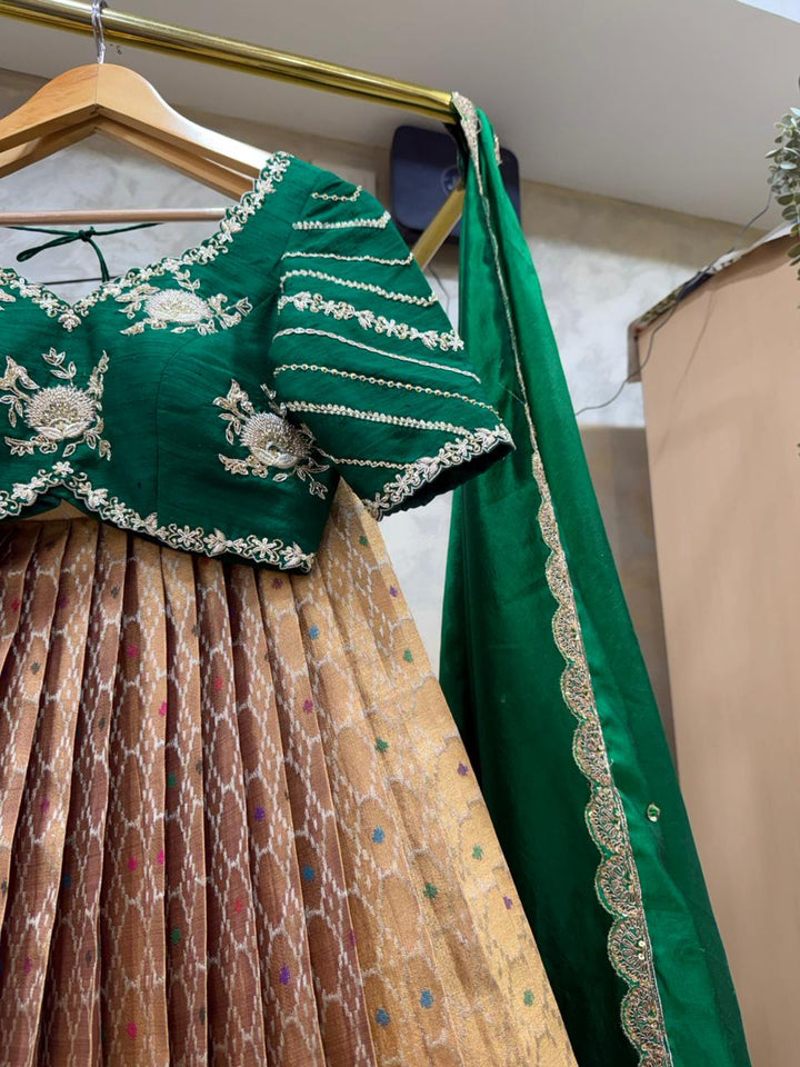 The  Bridal Green & Golden Tapestry Lehenga
