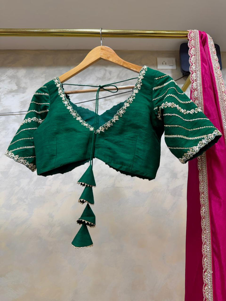 The  Bridal Green & Golden Tapestry Lehenga