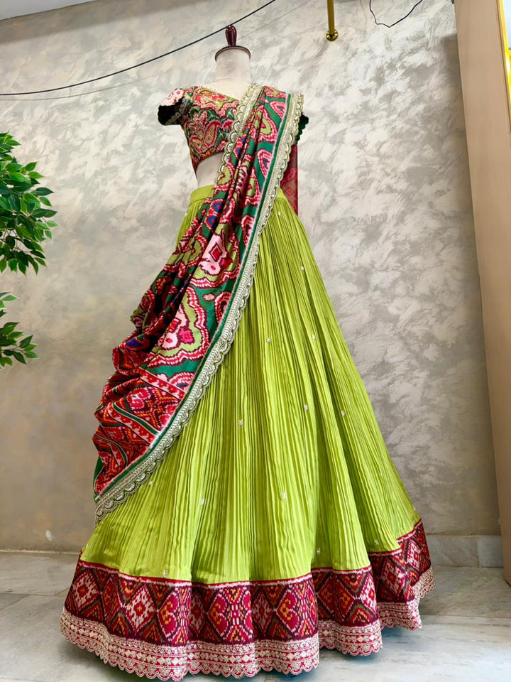 The Mayura Green Patola Lehenga