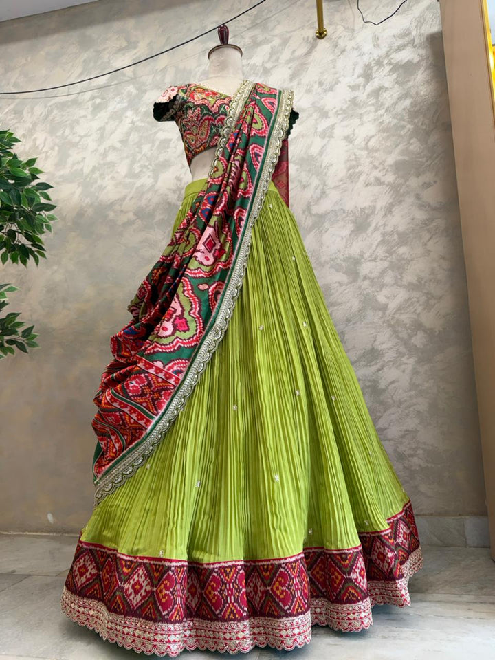 The Mayura Green Patola Lehenga