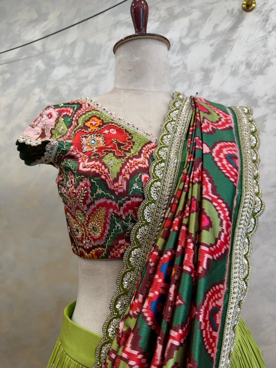 The Mayura Green Patola Lehenga