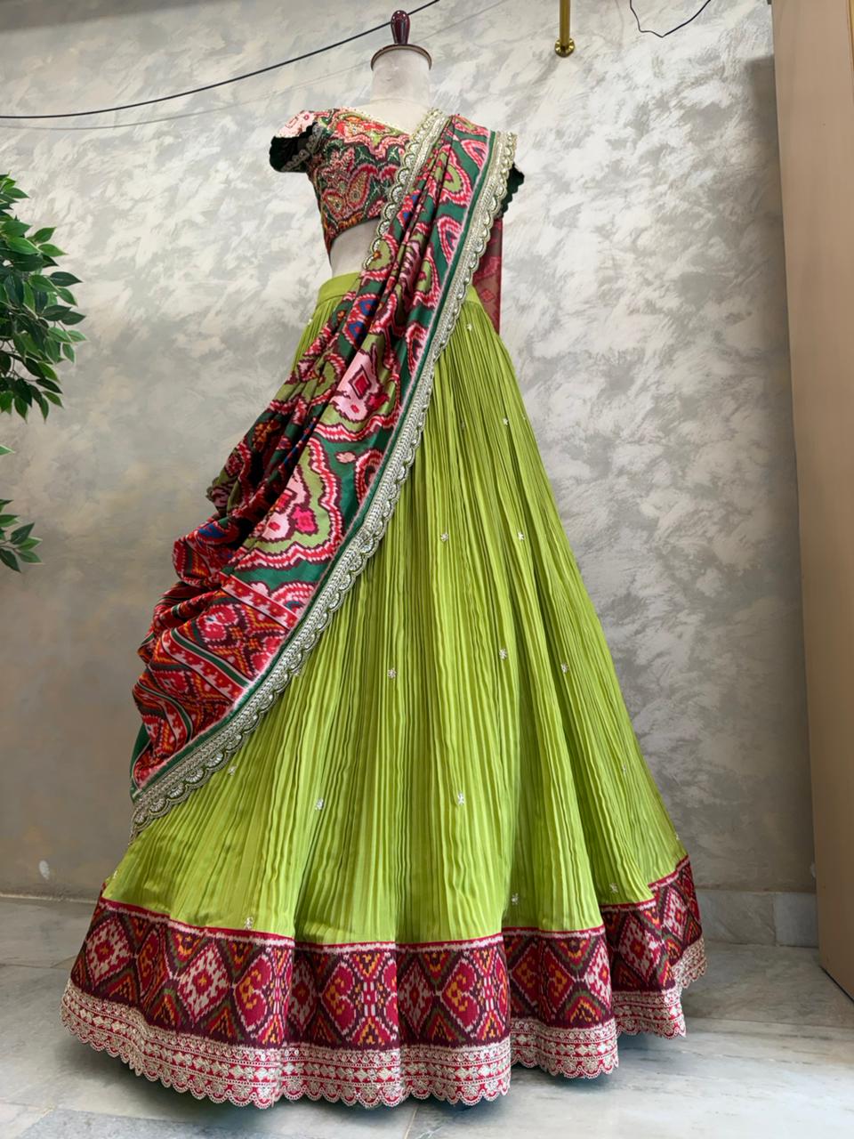 The Mayura Green Patola Lehenga