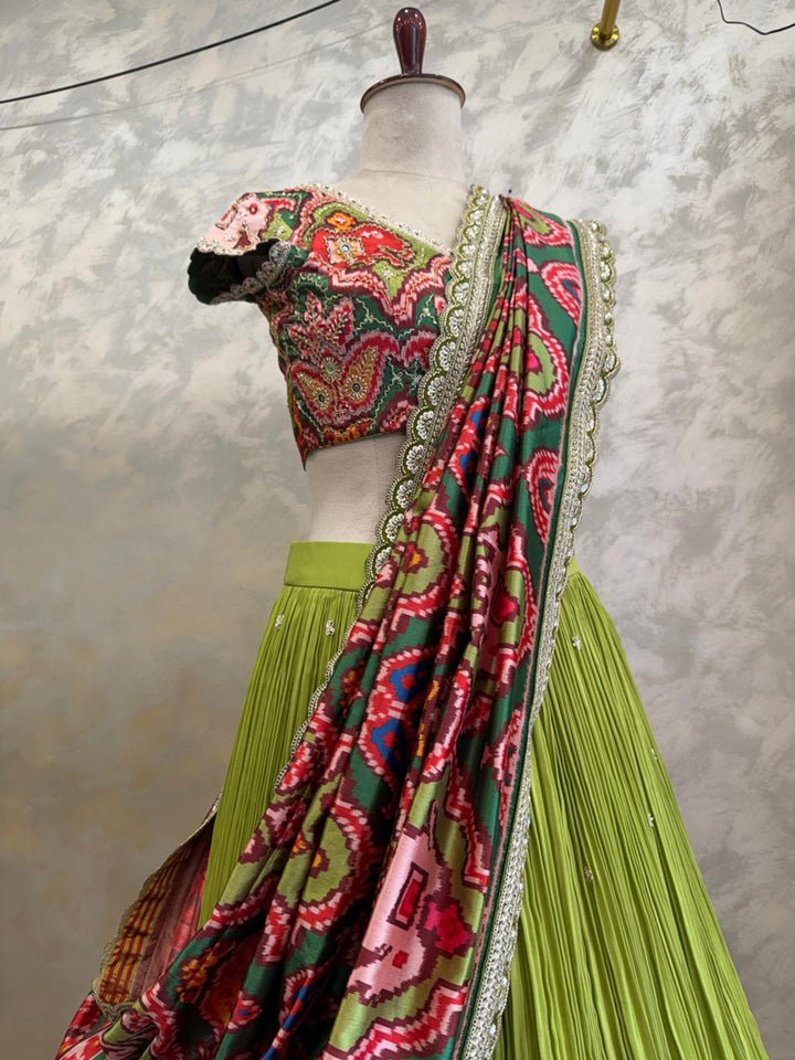 The Mayura Green Patola Lehenga