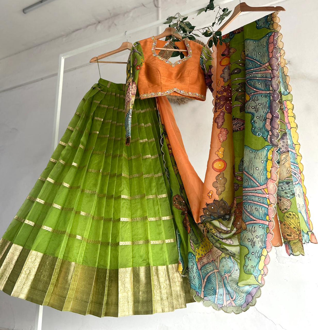 Green & PeachishOrange Organza Kalamkari Lehenga