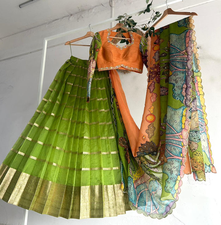 Green & PeachishOrange Organza Kalamkari Lehenga