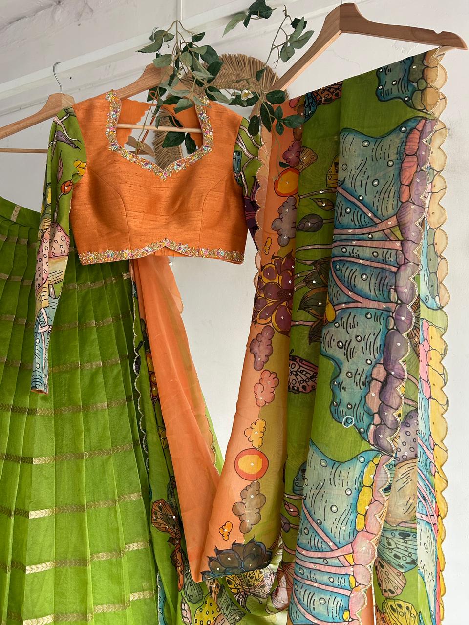 Green & PeachishOrange Organza Kalamkari Lehenga