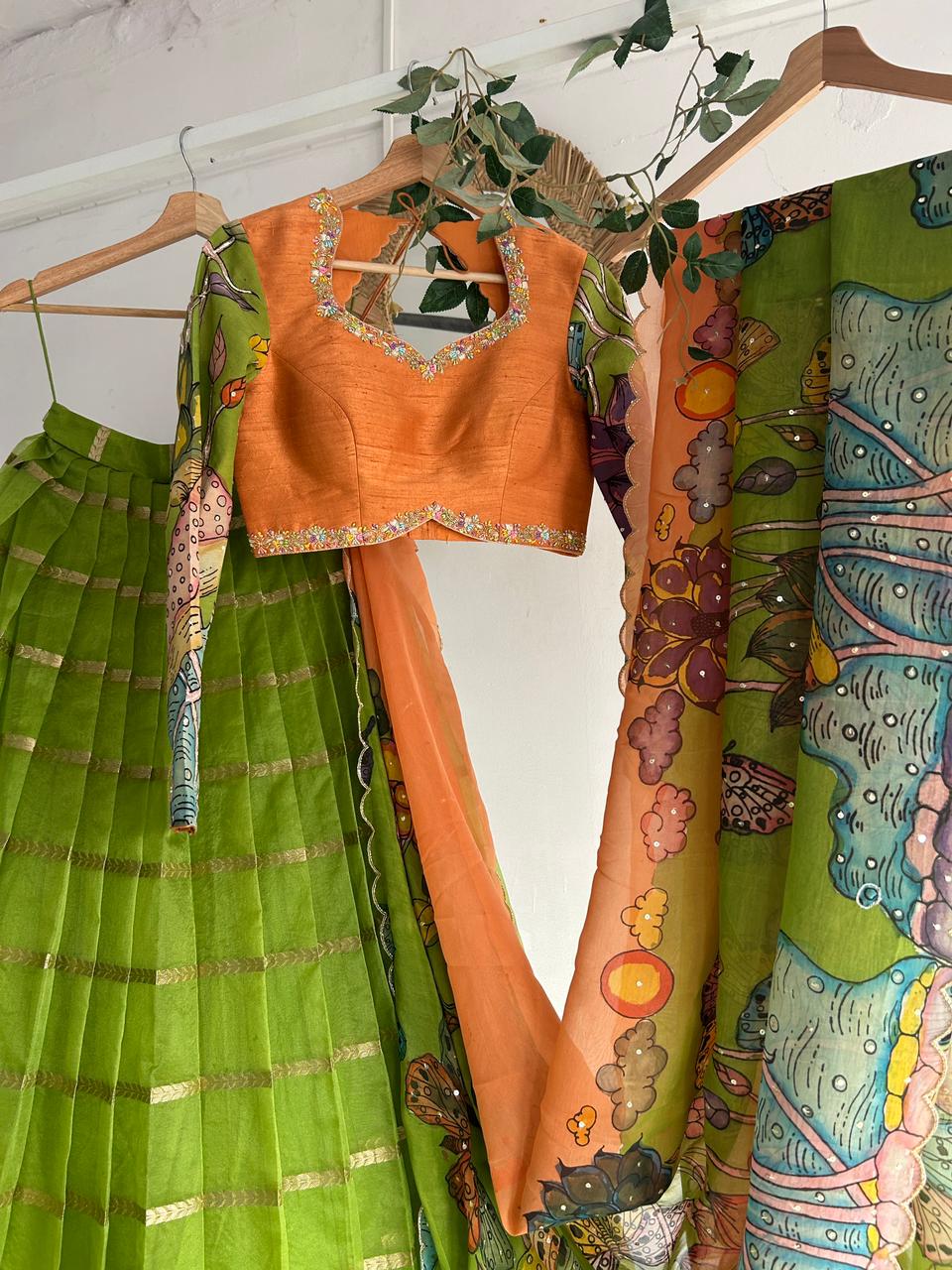Green & PeachishOrange Organza Kalamkari Lehenga