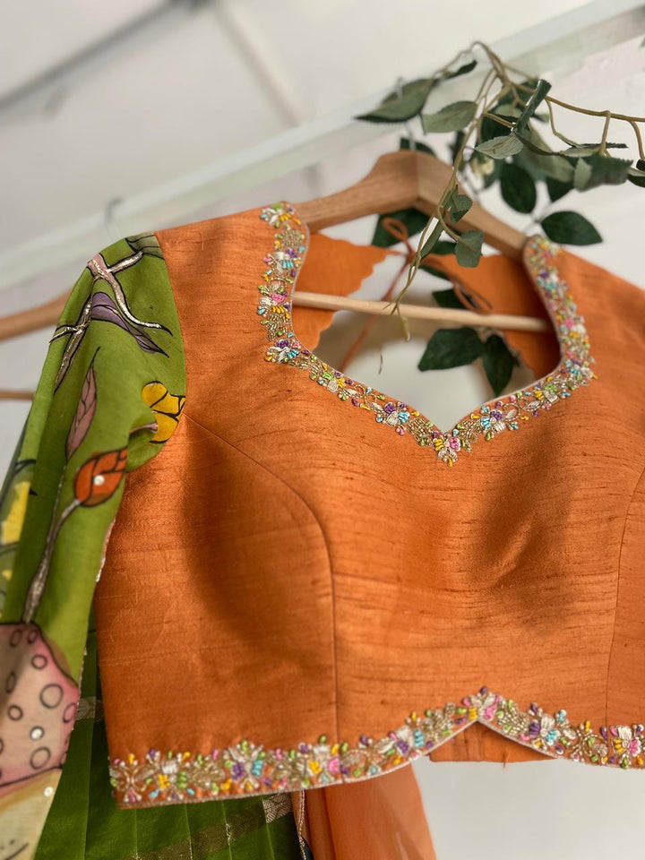 Green & PeachishOrange Organza Kalamkari Lehenga