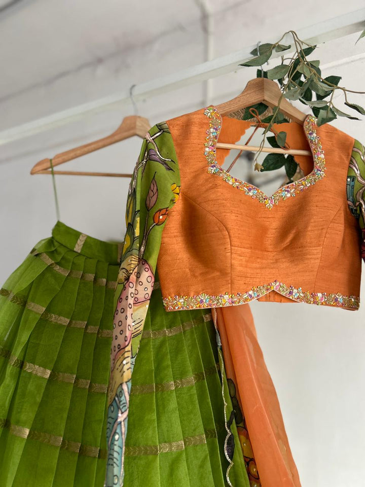 Green & PeachishOrange Organza Kalamkari Lehenga