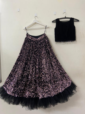 Stunning Black Sequin Velvet Lehenga with sparkling embellishments, perfect for women seeking a glamorous and sophisticated party wear option.